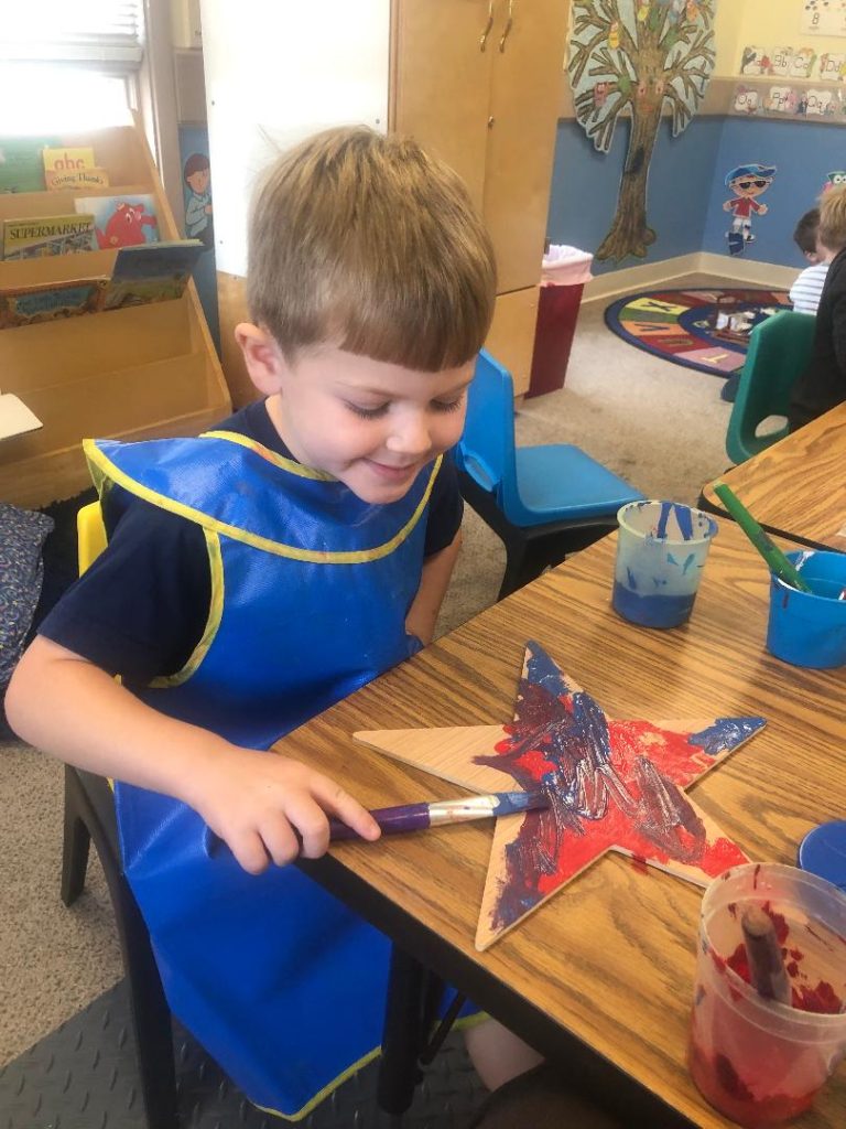 Kids painting their Stars of Hope