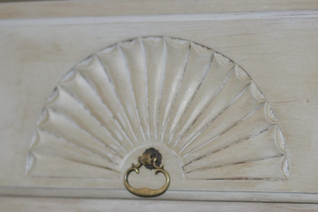 Carved details in vintage furniture drawers