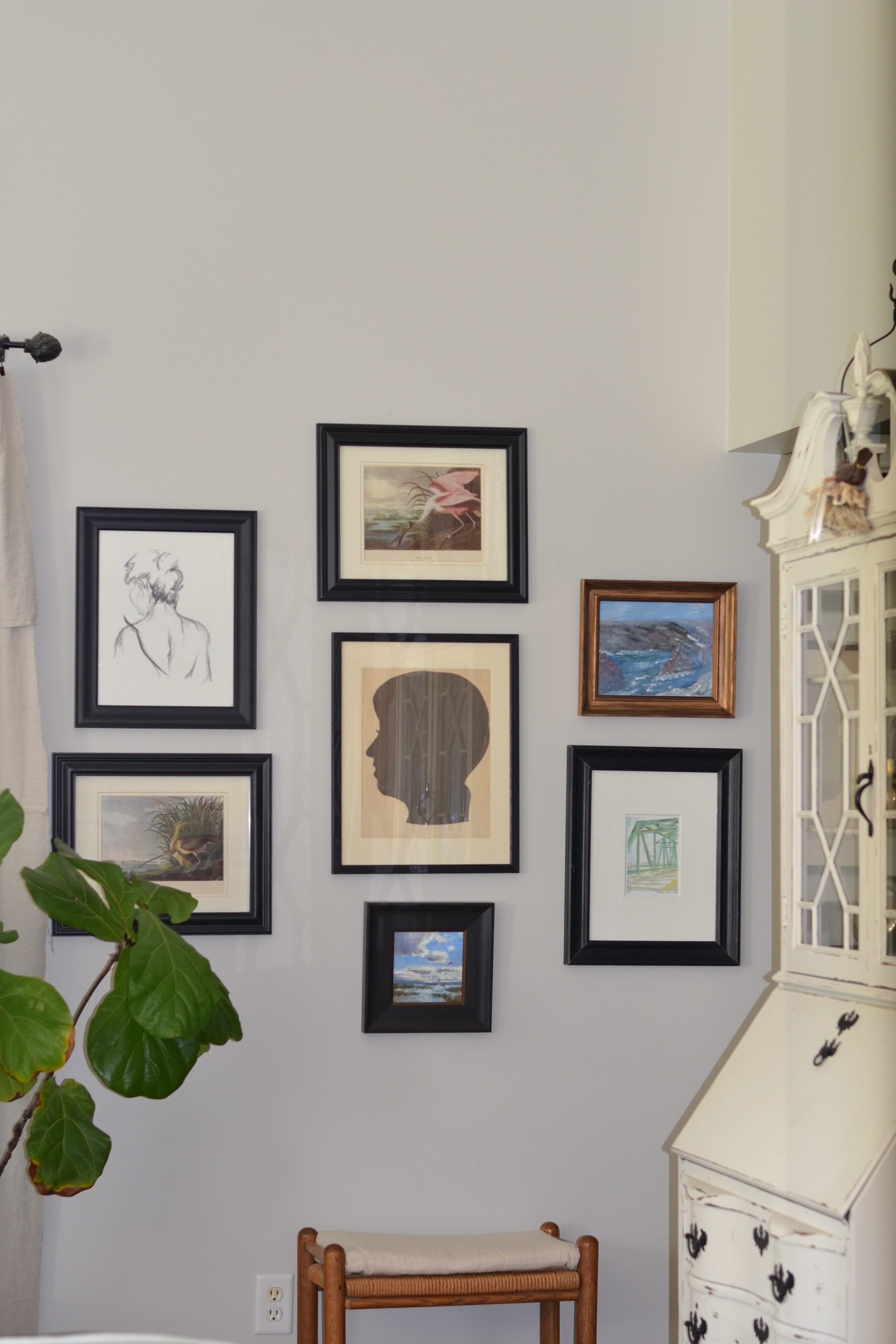 Tips for creating an eclectic gallery art wall